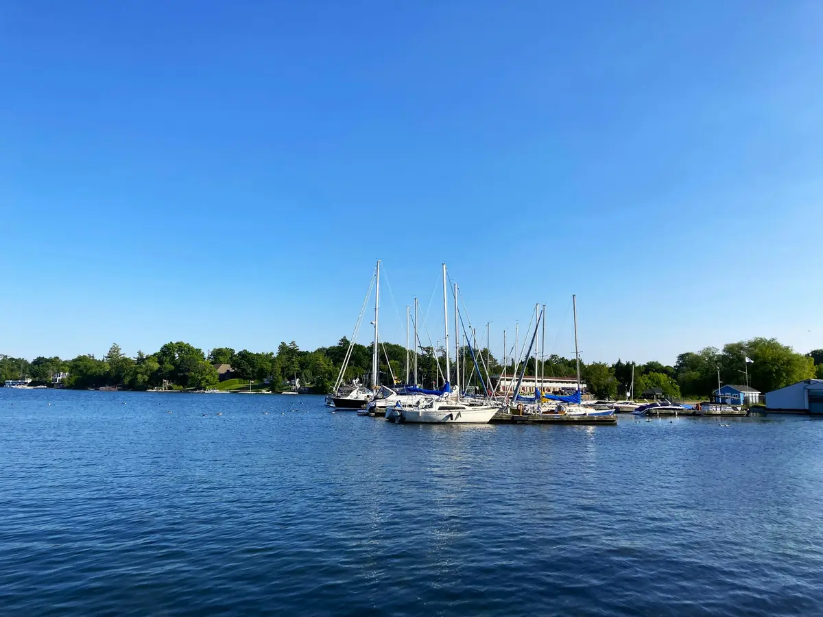 Marina on Lake Simcoe with sailboats moored under a blue sky